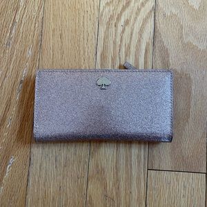 Kate Spade light pink sparkly wallet. Good condition.